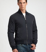 This lightweight bomber makes a smooth transition into those cool, autumn nights to come, effortlessly shaped in a rich cotton blend.Two-way zip frontStand collarSlash waist pocketsZippered pocket at sleeveRibbed knit collar, cuffs and hemAbout 24 from shoulder to hem98% cotton/2% elastaneMachine washMade in USA