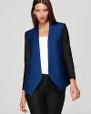 Color-blocking takes on chic shape in this Tibi tuxedo jacket--the perfect top layer to your workday essentials.