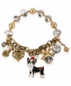 Puppy love. This multi-charm half stretch bracelet from Betsey Johnson is sure to evoke some strong feelings. Crafted from antique gold-tone mixed metal and glass accents, the bracelet's charms tell a whimsical story. Item comes packaged in a signature Betsey Johnson Gift Box. Approximate length: 7-1/2 inches.