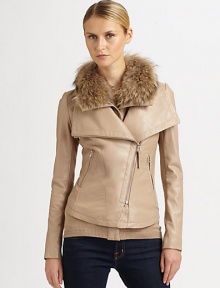 Topped with a natural Asiatic raccoon fur collar, this buttery leather jacket features a fashion-forward asymmetrical zipper and slash pockets.Fur-trimmed collarAsymmetrical zipperZipper slash pocketsIntricate seamsFully linedAbout 22 from shoulder to hemBody: leatherCombo: 52% wool/48% acrylicDry clean by fur and leather specialistImportedFur origin: Finland Model shown is 5'11 (180cm) wearing US size Small. 