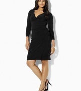 Shirring at one side creates a sleek, flattering silhouette on a dress that's rendered in smooth matte jersey for a look of smart sophistication.