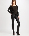 Shapely style with rich, leather-like sleeves and a shimmery knit body with a contoured hem. BoatneckDropped shouldersLong faux leather sleeves with knit cuffsContour cropped front hem with faux leather bandFully linedBody: 90% acetate/10% LurexTrim: polyesterDry cleanMade in USAModel shown is 5'10 (177cm) wearing US size Small.