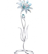 Always in bloom, the Paradise Dellaria flower figurine refracts light in iridescent Swarovski crystal that changes color when you change your perspective. With a graceful, silvertone metal stem.