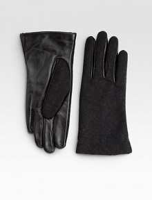 This cold weather necessity is revamped with buttery soft leather palms design with touchscreen technology for easy access to electronics.About 8 longCashmere liningPalm: leather Outer: polyester/wool/viscoseImported