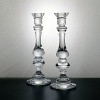 Create a dramatic, stately look with this outstanding set of 11 crystal candlesticks. Weston's profile features a beautifully sculpted spindle design - the perfect accent for any décor.