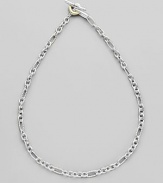 Sterling silver and 18k gold small figaro chain. Toggle closure 18 long Imported