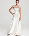 An ornately embellished bodice lends opulent beauty to this Sue Wong gown of sweeping glamour.