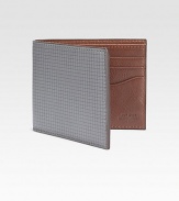 Inspired by the standard geometric graph paper, this leather credit card holder finds the balance between practicality and style.One billfold compartmentSix card slotsLeather4W x 4HImported