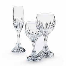 Pleasingly round curves captured in a scintillating dress of light. The rich, beveled pattern is ideally suited to emphasizing the gleam of the luminous, full-lead crystal for the ultimate in refinement at the table. Shown left to right: massena flute, massena goblet, massena large goblet. Also available: massena wine.