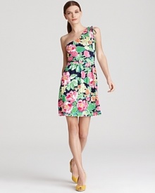 A breezy silhouette lends movement to vibrant florals for a Lilly Pulitzer dress blooming with feminine charm. Complement the bouquet of hues with color-pop pumps.