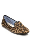 Silky leopard print adds undeniable animal magnetism to the sleek smoking flat. By Charles Philip.