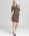 Channel your animal instincts in this Trina Turk dress, crafted in a cozy sweater knit for fashion forward comfort.