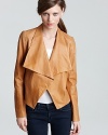 In a delectable caramel color, this Theory leather jacket is the styling piece that completes staples looks with modern luxury. The open silhouette slips on in an instant--perfect with everything from downtown denim to uptown pencil skirts.