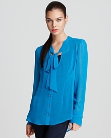 In neon blue, this boldly saturated Patterson J. Kincaid blouse stands out against white denim. Accessorize with a statement clutch in neon patent.