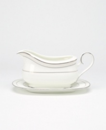 This versatile and stylish gravy boat with tray will coordinate perfectly with a variety of table linens and flatware. An ornate scroll motif trimmed in platinum adds a sophisticated sensibility to your tabletop.