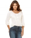 Rendered from lightweight cotton and featuring a vintage-inspired design, this DKNY jeans top is a romantic classic!