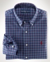 Classic-fit plaid twill shirt tailored from smooth mercerized cotton twill in a colorful plaid print, the handsome trim-fitting sport shirt exudes timeless preppy style.