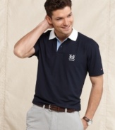 Tee up with classic style wearing this polo shirt from Tommy Hilfiger.