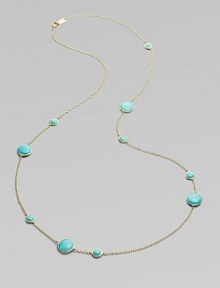 From the Lollipop Collection. Multi-sized, turquoise cabochons, elegantly placed on either side of a radiant, 18k gold chain. Turquoise 18k gold Length around neck, about 37 Diameter, about ¼ - ½ Lobster clasp ImportedPlease note: Due to the characteristics of natural stone, color and pattern may vary slightly. 