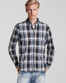 Dress up your denim with this boldly checked shirt from Diesel.