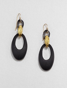 From the Lucite Collection. Sleek oval loops of hand-painted, hand-sculpted Lucite are connected by a golden bale with a rich pebble texture.LuciteGoldtoneLength, about 2.4Ear wireMade in USA