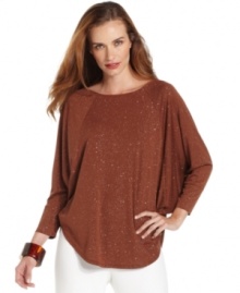 Ellen Tracy's sparkling V-neck top features a dramatic silhouette and glittery fabric for a dash of elegance.