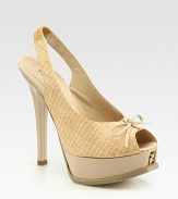 Grounded by a skinny heel and logo-embedded platform, this textured straw style features a slingback and dainty bow. Self-covered heel, 5 (125mm)Island platform, 1½ (40mm)Compares to a 3½ heel (90mm)Straw upperLeather lining and solePadded insoleMade in ItalyOUR FIT MODEL RECOMMENDS ordering one half size up as this style runs small. 