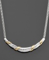 A sunny twist of 14k gold is lovingly wrapped around round-cut diamonds (1/5 ct. t.w.) and sterling silver in this diamond necklace. Approximate length: 15 inches.