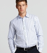 This elegant Michael Kors tailored shirt boasts a slim fit and sky blue alternating stripe pattern.