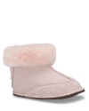 A cutie bootie from UGG® Australia, with elastic back and shearling lining to keep their feet warm and dry.