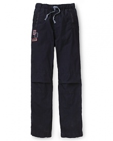 Sporty track pants by GUESS Kids get a stylish accent with logo details and a drawstring waist.