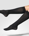 Classic velvet-soft knee-highs in an opaque and matte look. Comfortable wide band Opaque 50 denier Nylon/elastene; hand wash Imported