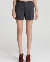 The perfect trend-right shorts for the season, this pair boasts pleats and cuffs in a herringbone weave. Pair with heels for a ladylike tailored look.