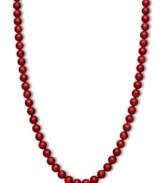 Crimson chic. This brilliantly-hued strand necklace features bold red agate beads (190 ct. t.w.) in a polished 14k gold setting. Approximate length: 18 inches. Approximate bead diameter: 8 mm.