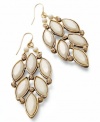 Crème de la crème. Sweet ivory navette stones and glass accents adorn Style&co.'s chic drop earrings. Set in gold tone mixed metal. Approximate length: 2-1/4 inches. Approximate width: 1 inch.