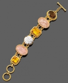 A colorful bracelet with a touch of antique style featuring smokey quartz (11 ct. t.w.), rose quartz (17x25 mm), white agate (18 mm) and golden citrine (13-1/4 ct. t.w.) set in 14k gold over sterling silver. Approximate length: 7-1/4 inches.