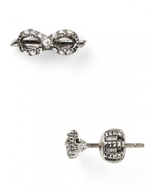 Make a girlie glam statement with these bow-shaped studs from Juicy Couture, accented by cubic zirconia stones.