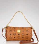 The classic MCM print covers a chic, chain-strapped bag that easily converts to a sleek clutch.