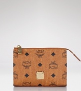 A petite logo-print case stores your must-have cosmetics in grand retro style. By MCM.