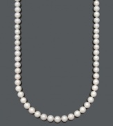 Layer yourself in three feet of glorious, polished pearls. This beautiful necklace by Belle de Mer features AA+ cultured freshwater pearls (11-12 mm) with a 14k gold clasp. Approximate length: 36 inches.