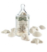 Nine assorted seashell-shaped soaps, fragrant with White Honeysuckle and Baby Jasmine. Presented in a classic glass apothecary jar and tied with a satin ribbon. 