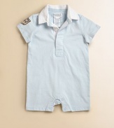 Preppy short-sleeved shortall in soft cotton is designed with an athletic patch on the arm for a sporty look.Ribbed polo collarShort sleevesHidden front button placketBottom snapsCottonMachine washImported Please note: Number of buttons and snaps may vary depending on size ordered. 