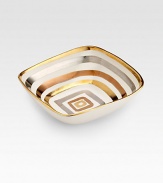 A beautiful design inspired by the pageantry of ancient horseraces, handcrafted in pristine porcelain with concentric circles glazed in 24k gold, platinum and rose gold. Dishwasher safe 4¾W X 1½H X 4¾D Made in USA 