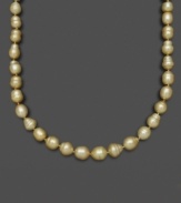 Like individual nuggets of gold, these pearls feature a unique, asymmetrical texture and design. Belle de Mer's rich necklace features golden cultured south sea pearls (9-11 mm) set in 14k gold. Approximate length: 18 inches.