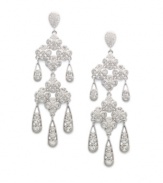 Rich bouquet: Eliot Danori's Les Fleurs floral-motif chandelier earrings will add a lavish finishing touch to your special occasion style. Earrings feature clear crystals set in silver tone mixed metal. Approximate drop: 3 inches.