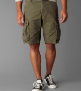 In transition. Dressed up or casual, these cargo shorts from Dockers will make you look good anywhere you need to go.