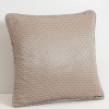 Embellished with a textured diamond print, dress up the bed with this decorative piece. Features a braided border.