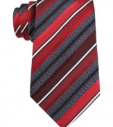 Take a new angle on stripes with this Kenneth Cole Reaction silk tie.