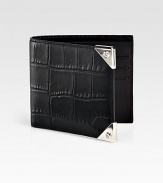 A simple bi-fold design receives a remarkably modern update, featuring six card slots and a billfold compartment, finished in exotic, croc-embossed leather.One billfold compartmentSix card slotsLeather5W x 4HImported