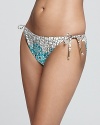 A teal ikat print bands together with a vintage-inspired floral on this vacation-ready Ella Moss bikini bottom.